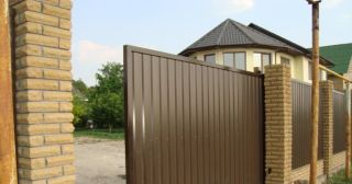 Купить откатные ворота из профнастила Вольск, цена от 1771 руб.